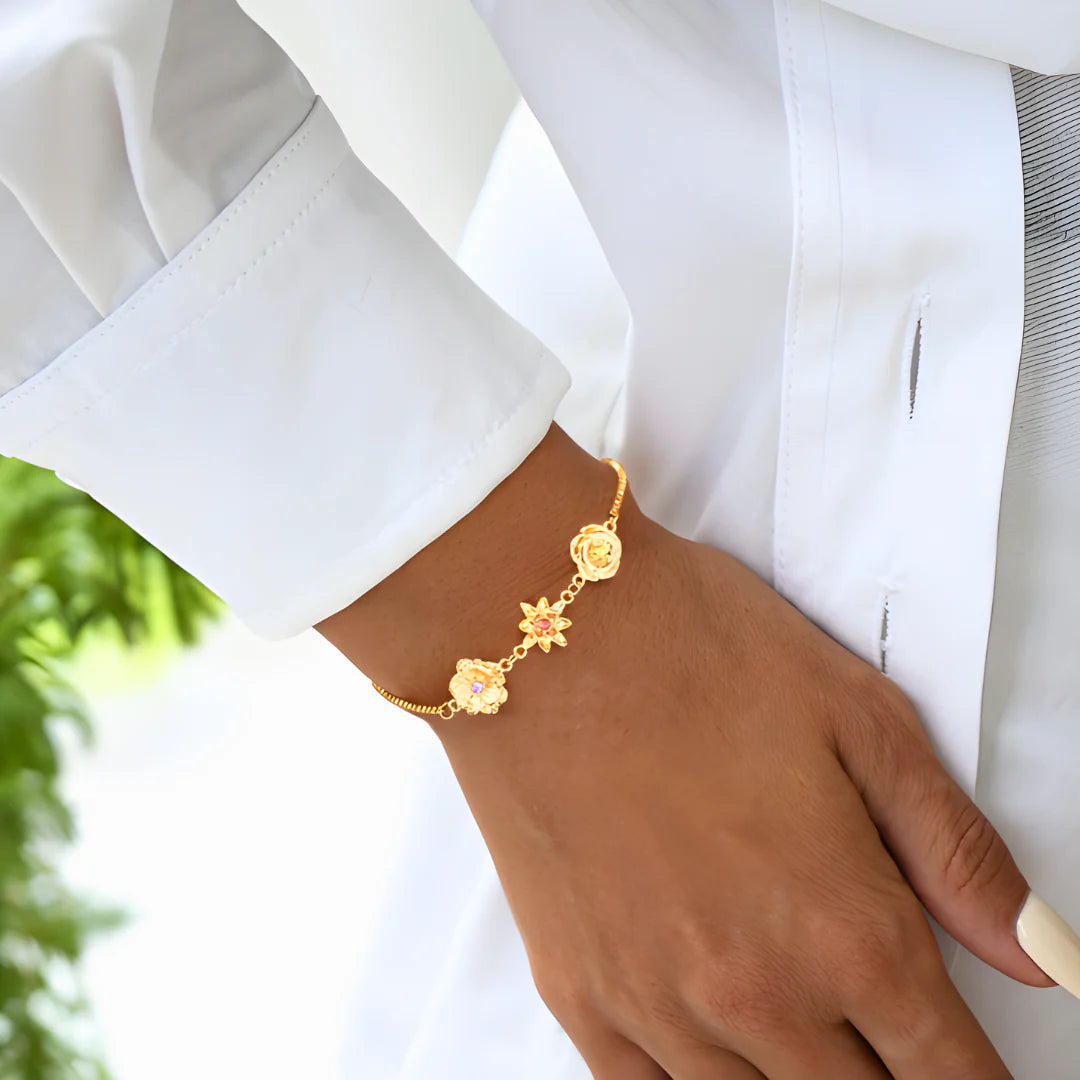 Bracelet Moderne Maille Ronde Avec Fleur Mobile Et Cristaux - Couleur Or 225 - Occasion Bon état